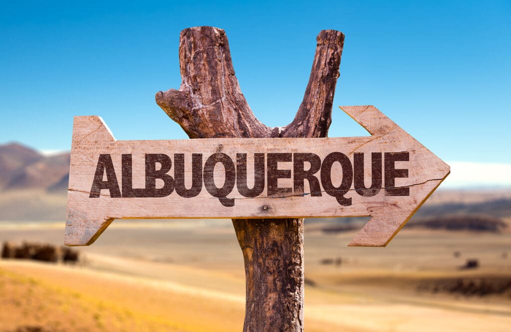 Albuquerque directional arrow in a desert by Tripps Plus Las Vegas